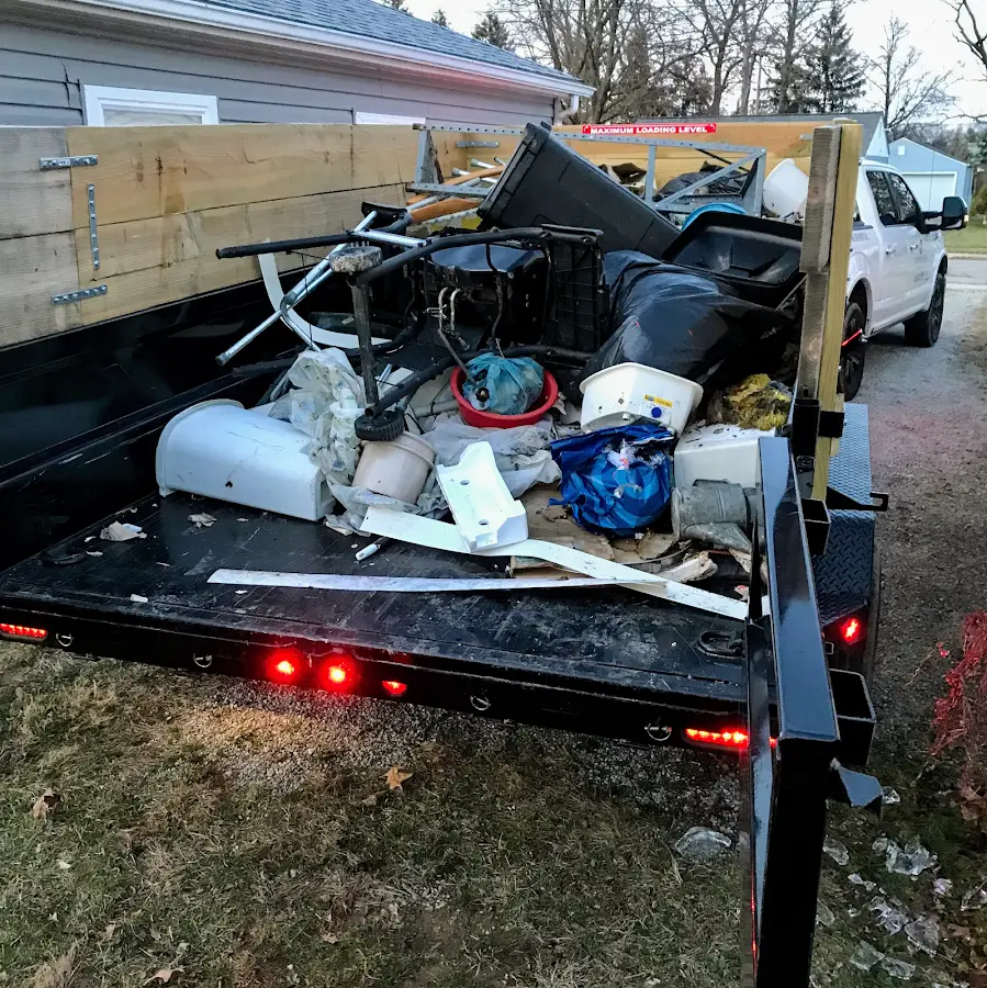 Roll-off dumpster delivered to a residential driveway in Highfill